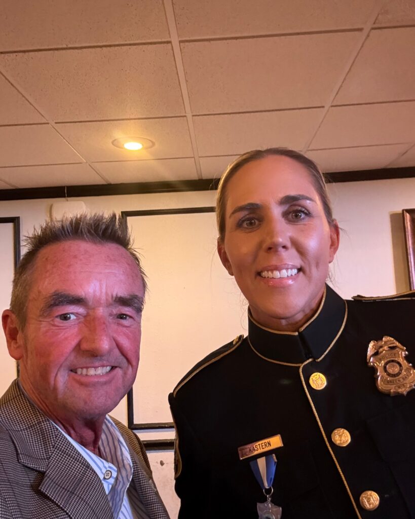 Jim Schmitt stands with Officer Shelly Kastern of the Green Bay Police Department at the Respect for Law Banquet.